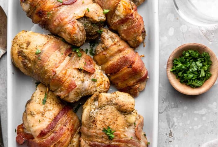 Bacon Wrapped Chicken Thighs image 703x1024 1
