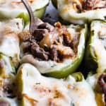 Low Carb Keto Philly Cheesesteak Stuffed Peppers - These stuffed peppers have all the flavors of your favorite sandwich in a healthy, low carb, easy weeknight meal that will please even picky eaters! Healthy comfort food at its best! | #Foodfaithfitness | #Glutenfree #Keto #Lowcarb #Healthy #Grainfree