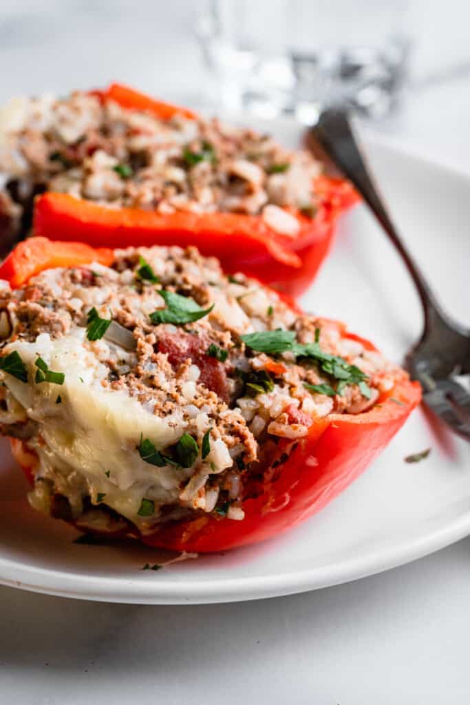 one Instant Pot Stuffed Peppers on a plate with a fork