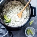 Instant Pot Cilantro Lime Rice - This super easy rice tastes like Chipotle's, is only 3 ingredients and is ready in 12 minutes - the perfect healthy side dish! | Foodfaithfitness.com | @FoodFaithFit