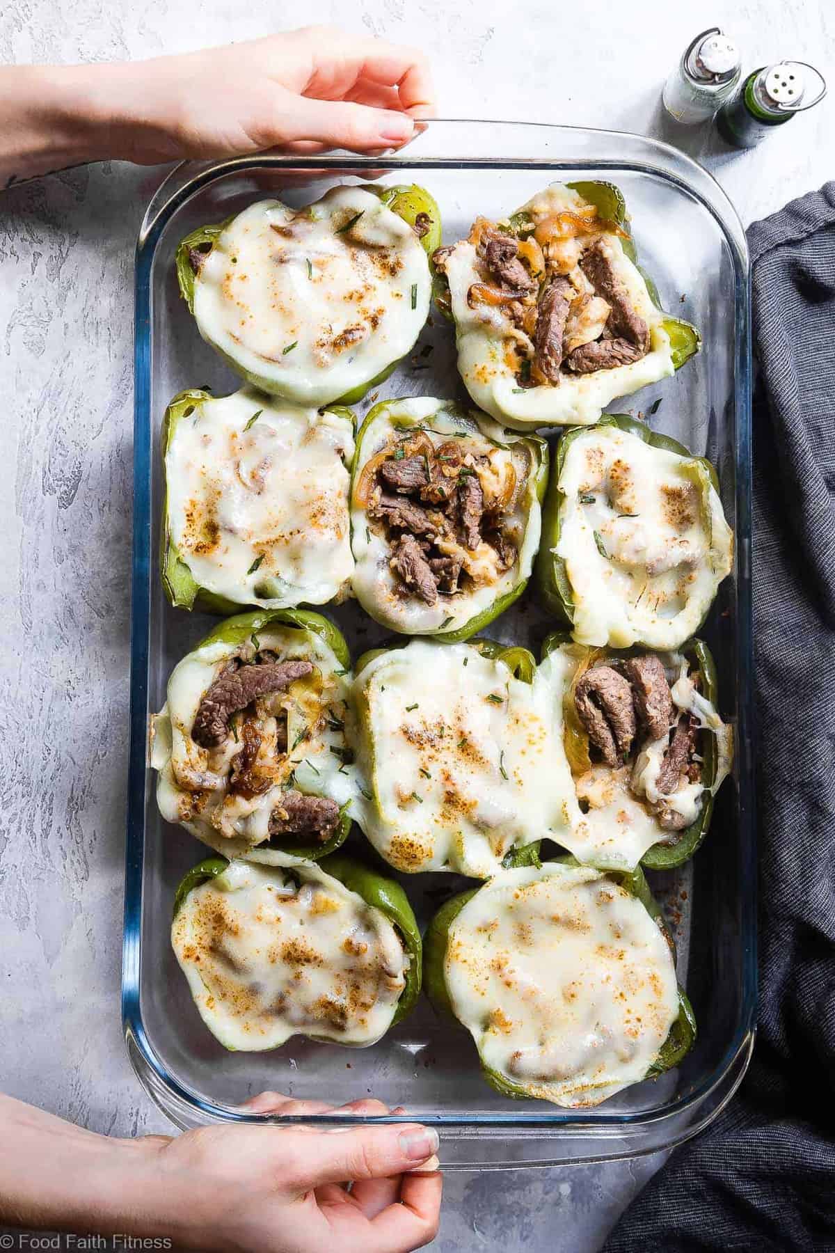 Cheesesteak Stuffed Peppers being served in a backing dish