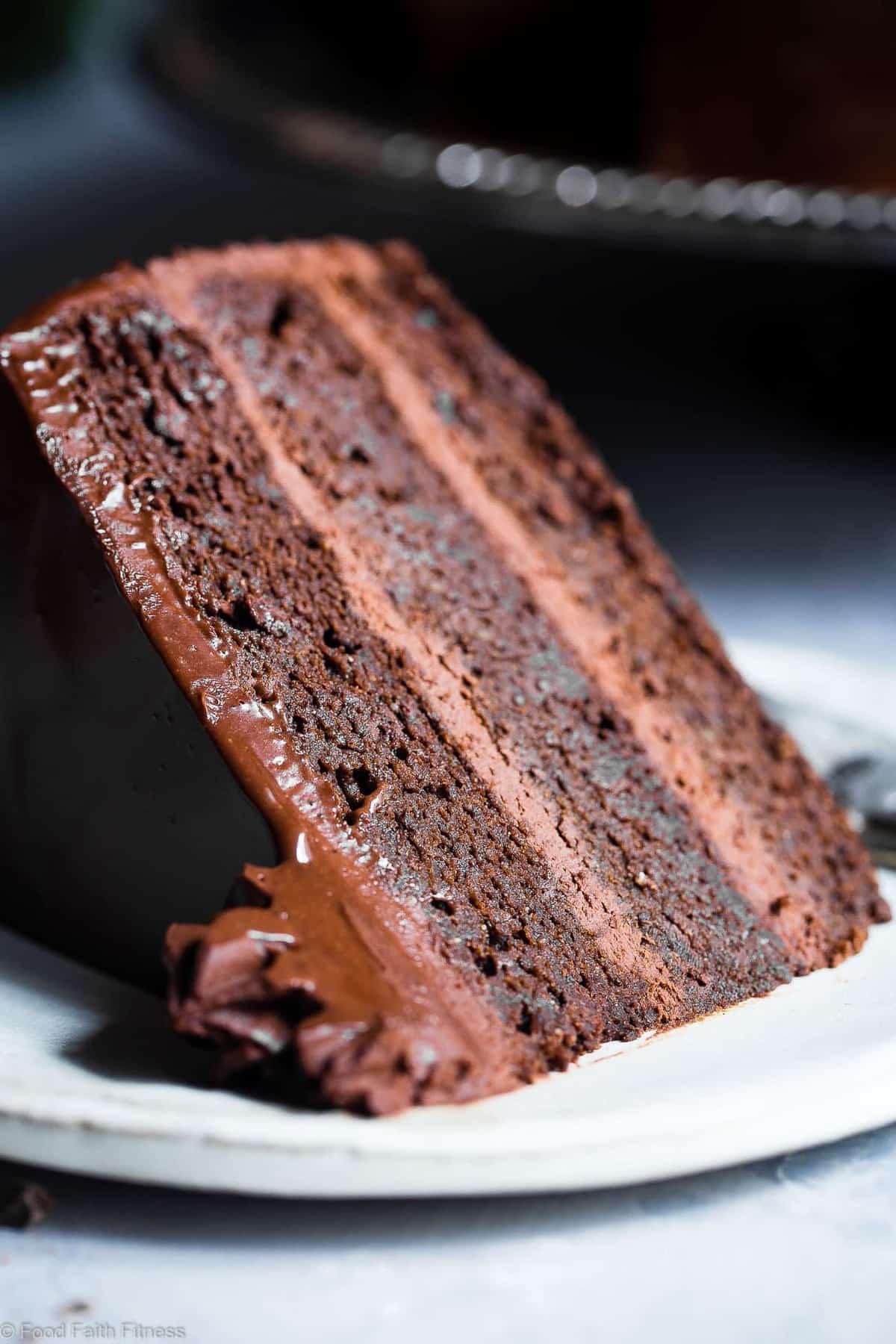 The Best Paleo Chocolate Avocado Cake - This dairy and gluten free Chocolate cake is SO fluffy and moist you'll never believe it's butter/oil free and made with avocado! The BEST healthy chocolate cake you will ever have! | #Foodfaithfitness | #Paleo #Grainfree #Dairyfree #Healthy #cake