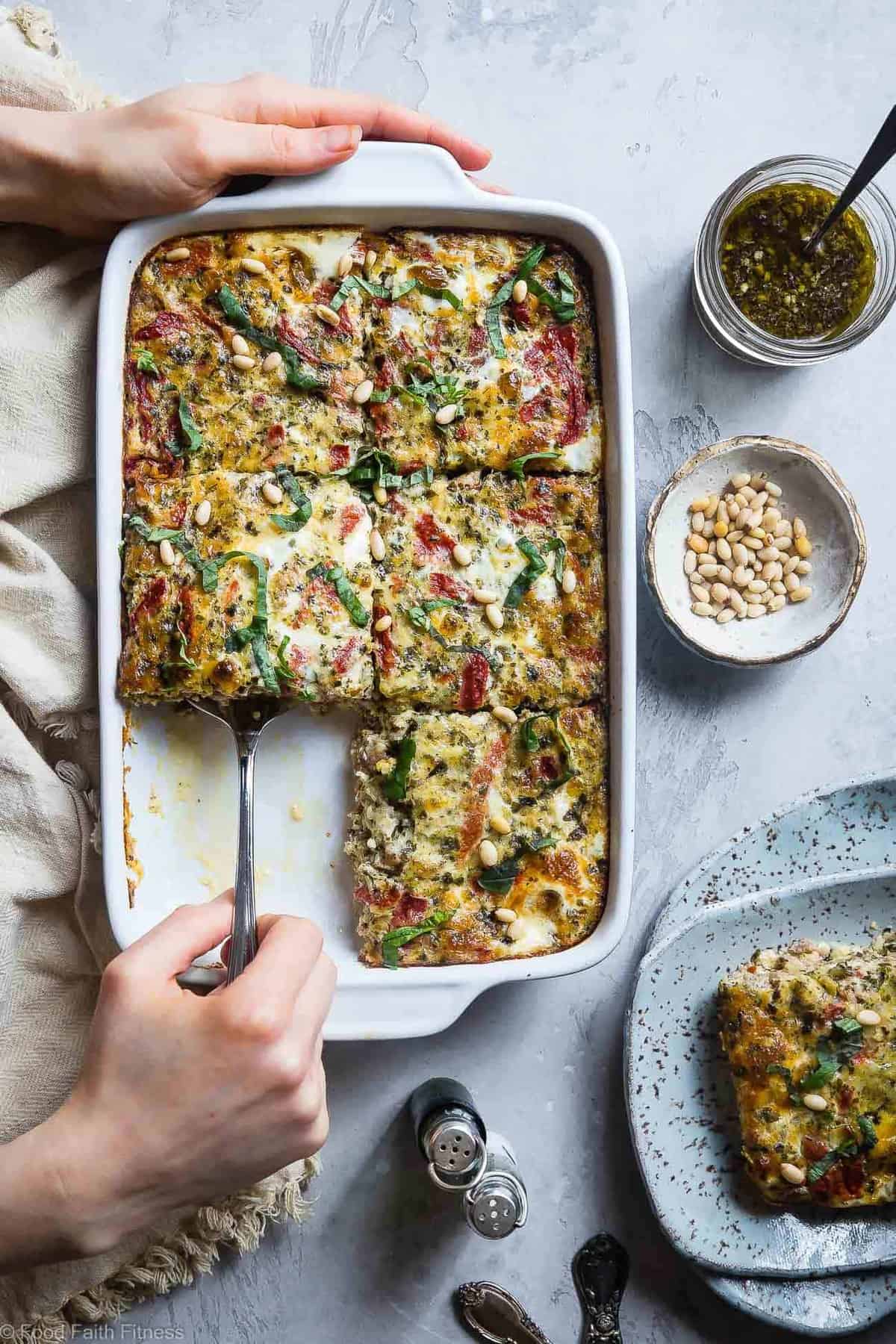 Keto Breakfast Casserole on a table with a slice being lifted out