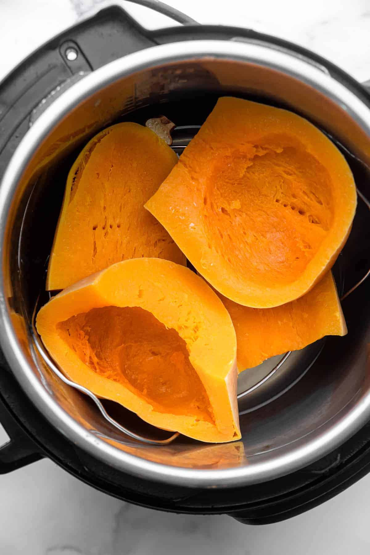 Instant Pot Butternut Squash in a pot ready to be cooked