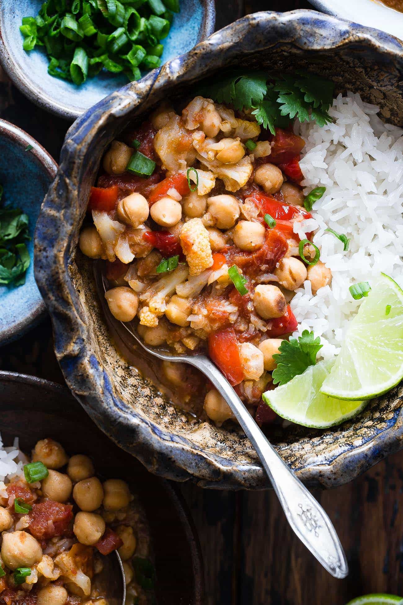 Instant Pot Vegan Chickpea Curry - This easy chickpea tomato curry is made in the Instant Pot and ready in 20 mins! It uses coconut milk and tomatoes to make it thick and so creamy! Makes great leftovers and is great for meal prep! | Foodfaithfitness.com | @FoodFaithFit