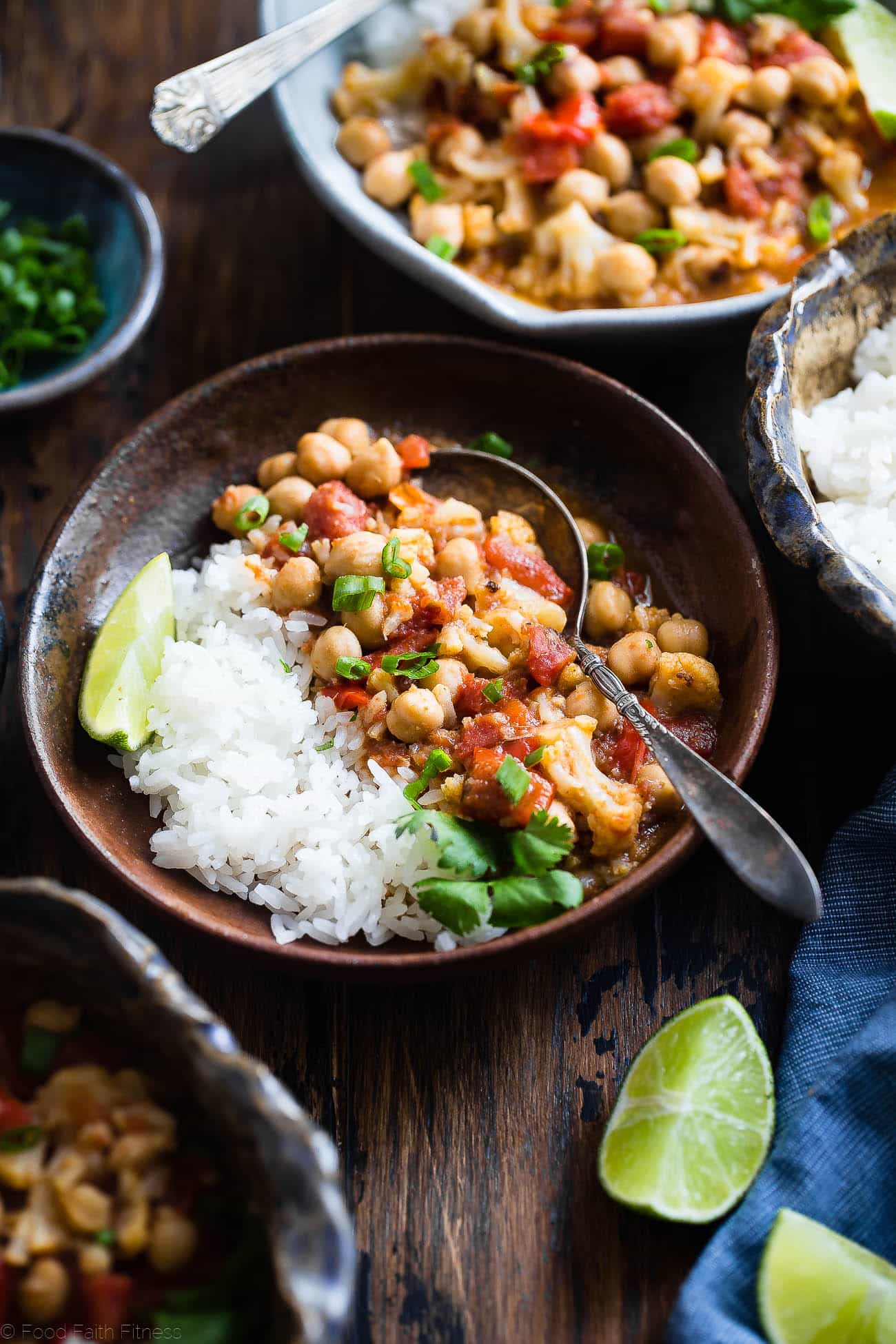 Instant Pot Vegan Chickpea Curry - This easy chickpea curry recipe is made in the Instant Pot and ready in 20 mins! It uses coconut milk and tomatoes to make it thick and so creamy! Makes great leftovers and is great for meal prep! | Foodfaithfitness.com | @FoodFaithFit